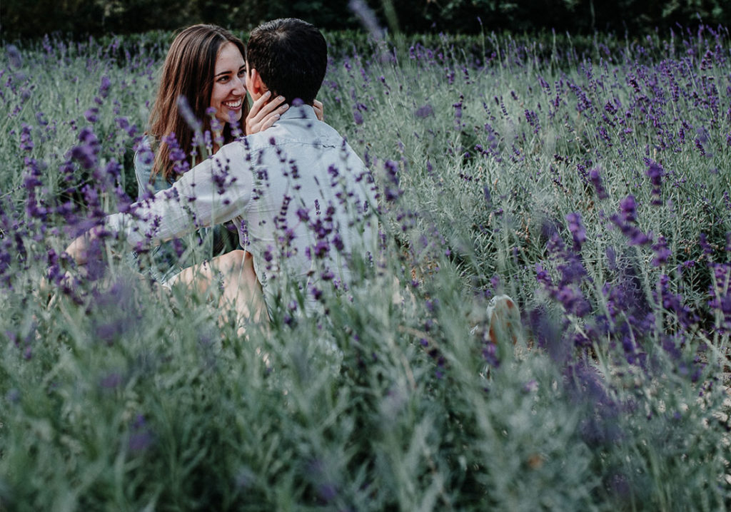 Couple sitting in lavender field