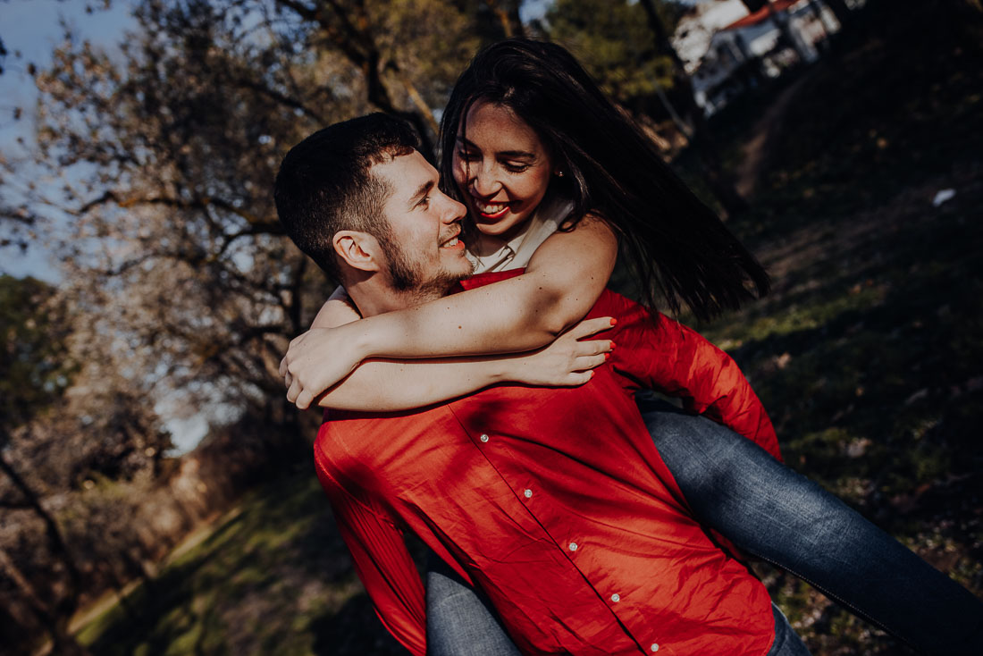 hugging couple having fun